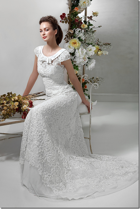 Halter wedding dresses with bow bust and Aline with Floral beading hemlline 